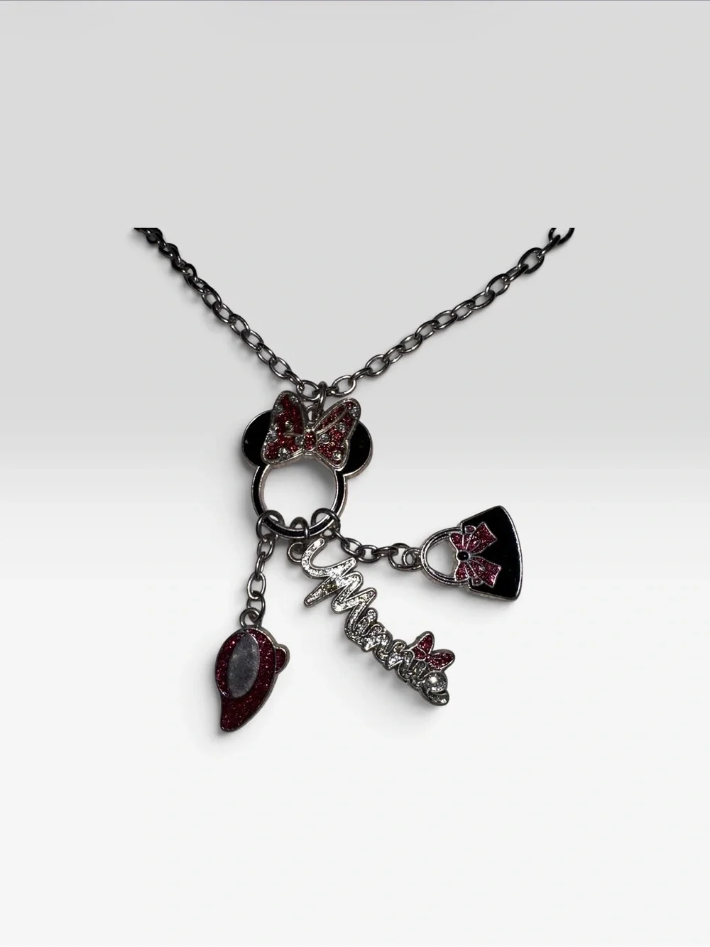 Minnie mouse necklace by Disney silver toned falls 13 inches